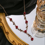 Ensemble de bijoux élégant avec collier et boucles d'oreilles en forme de fleur de rose