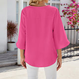 Chemise en mousseline de soie à col en V et à manches mi-longues, de couleur unie