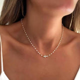 Collier croisé avec perles