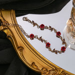 Ensemble de bijoux élégant avec collier et boucles d'oreilles en forme de fleur de rose