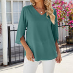 Chemise en mousseline de soie à col en V et à manches mi-longues, de couleur unie