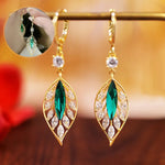 Boucles d'oreilles en rameaux d'or et feuilles de jade