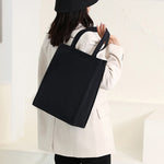 Sac à main de couleur unie