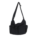 Sac messager en toile de couleur unie