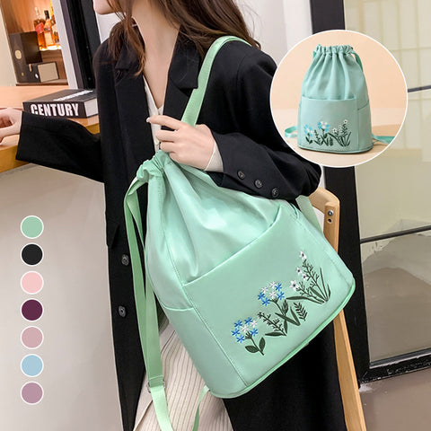 Sac à bandoulière brodé avec pochette à cordon