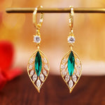Boucles d'oreilles en rameaux d'or et feuilles de jade