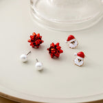Boucles d'oreilles en perles avec fleurs de Noël