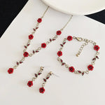 Ensemble de bijoux élégant avec collier et boucles d'oreilles en forme de fleur de rose