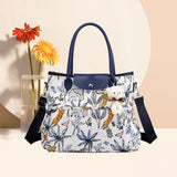 Sac maman portable avec plusieurs poches et grande capacité