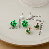 Boucles d'oreilles en perles avec fleurs de Noël