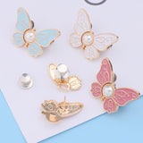 Boucle de taille papillon perle