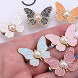 Boucle de taille papillon perle