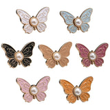 Boucle de taille papillon perle