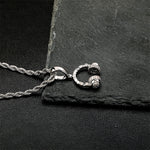 Collier à pendentif d'écouteurs