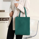 Sac à main de couleur unie