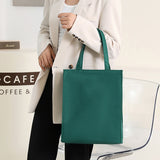 Sac à main de couleur unie
