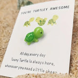 Tortue minuscule porte-bonheur