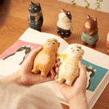 Ornement chaton sculpté en bois