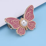 Boucle de taille papillon perle