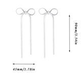 Boucles d'oreilles longues avec nœud