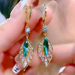 Boucles d'oreilles en rameaux d'or et feuilles de jade