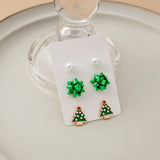 Boucles d'oreilles en perles avec fleurs de Noël