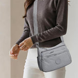 Sac bandoulière tendance uni à multiples poches zippées