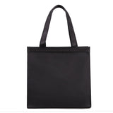 Sac à main de couleur unie