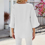Chemise en mousseline de soie à col en V et à manches mi-longues, de couleur unie