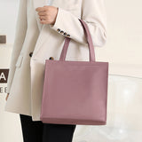 Sac à main de couleur unie