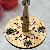 Porte-fil en bois pour le poignet