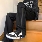 Pantalon droit à fermeture éclair triple défense