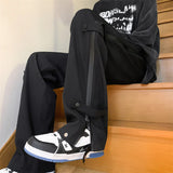 Pantalon droit à fermeture éclair triple défense