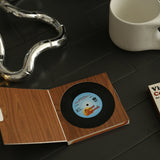 Sous-verre à disque