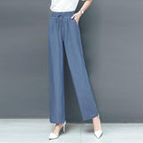 Pantalon ample taille haute en soie glacée