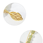 Boucles d'oreilles en rameaux d'or et feuilles de jade