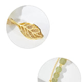 Boucles d'oreilles en rameaux d'or et feuilles de jade