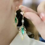 Boucles d'oreilles en rameaux d'or et feuilles de jade