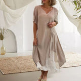 Robe asymétrique à manches courtes et col en V