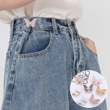 Boucle de taille papillon perle