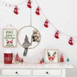 Plaques de porte décorées par un gnome de Noël DIY
