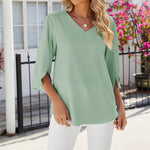 Chemise en mousseline de soie à col en V et à manches mi-longues, de couleur unie