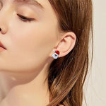 Boucles d'oreilles en perles avec fleurs de Noël