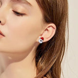 Boucles d'oreilles en perles avec fleurs de Noël