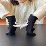 Gants magnétiques pour le maintien des mains