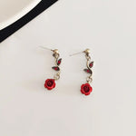 Ensemble de bijoux élégant avec collier et boucles d'oreilles en forme de fleur de rose