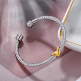 Bracelet torsadé à nœud bicolore