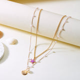 Collier croisé avec perles