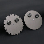 Broche en forme de roue tournante