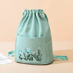 Sac à bandoulière brodé avec pochette à cordon